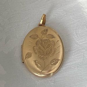 Vintage gold locket etched with flower design